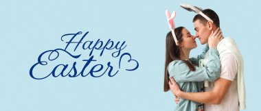 Mutlu genç çiftin tavşan kulağı taktığı Paskalya bayrağı