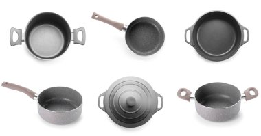 Beyaz tencerelere ayrılmış farklı tencereler.  