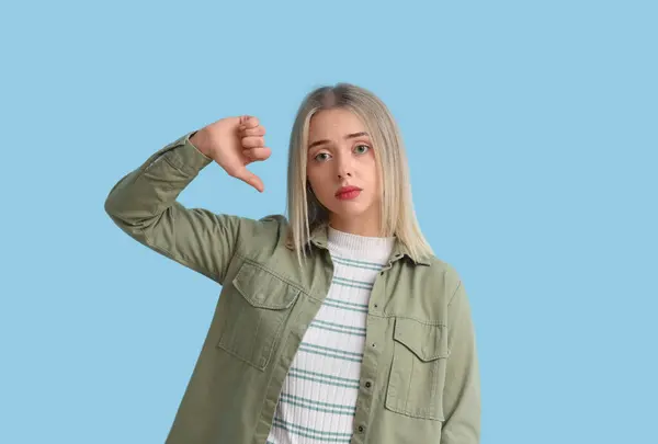 Upset Young Woman Showing Dislike Blue Background — Stockfoto