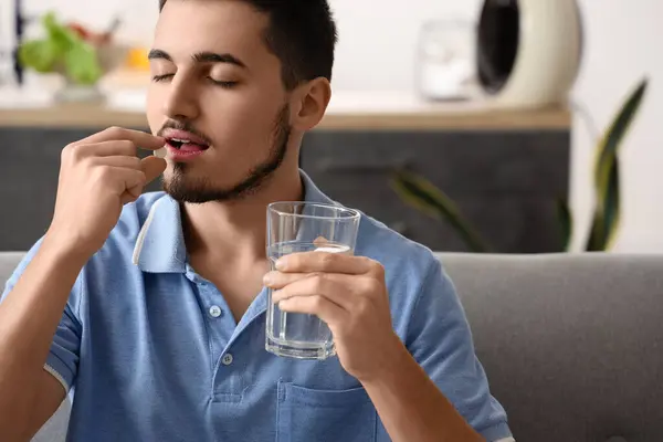 Young Man Glass Water Taking Pills Home — Stock Photo, Image