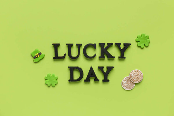 LUCKY DAY Words LUCKY Day and decor for St. Patrick 's celebration on green background