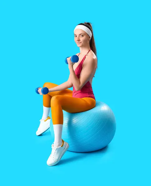 Sporty Young Woman Fitball Dumbbells Blue Background — Stock Photo, Image
