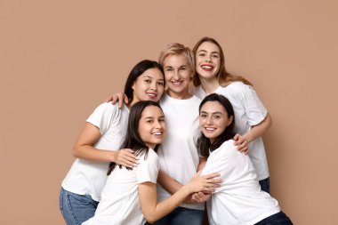 Many beautiful women on beige background. Women history month