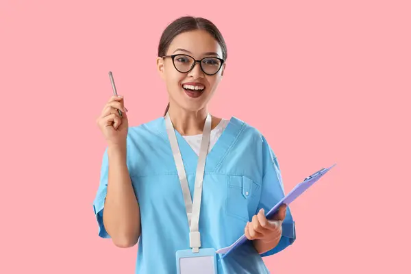 Asian Medical Intern Clipboard Pink Background — Stock Photo, Image