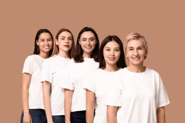 Many beautiful women on beige background. Women history month