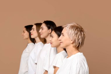 Many beautiful women on beige background. Women history month