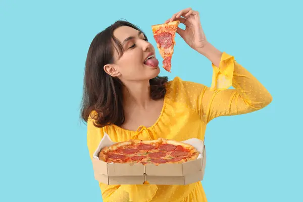 Young Woman Tasty Pepperoni Pizza Blue Background — Stock Photo, Image