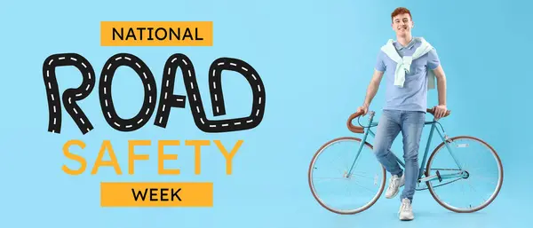Young redhead man with bicycle on light blue background. Banner for National Road Safety Week