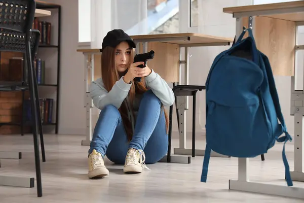 Female student with gun in classroom