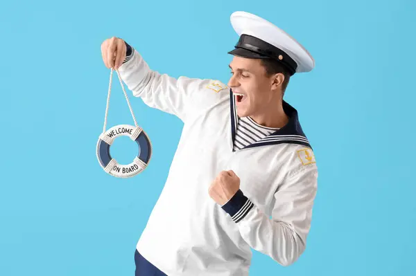 Young Sailor Small Ring Buoy Blue Background — Stock Photo, Image