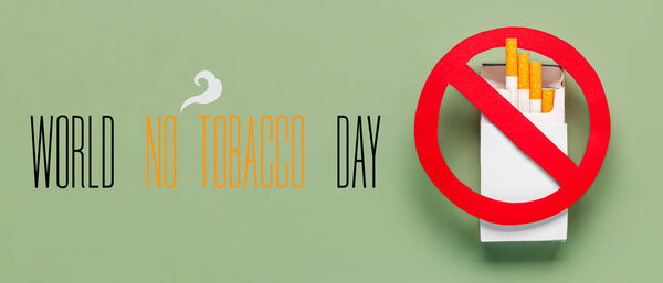 Box of cigarettes with STOP sign on green background. Banner for World No Tobacco Day