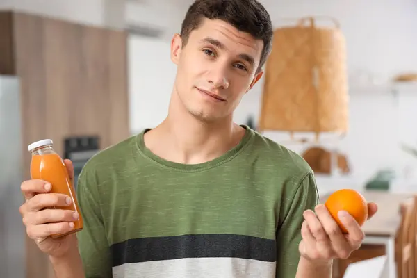 Young Man Bottle Juice Orange Kitchen Closeup — Stock Photo, Image