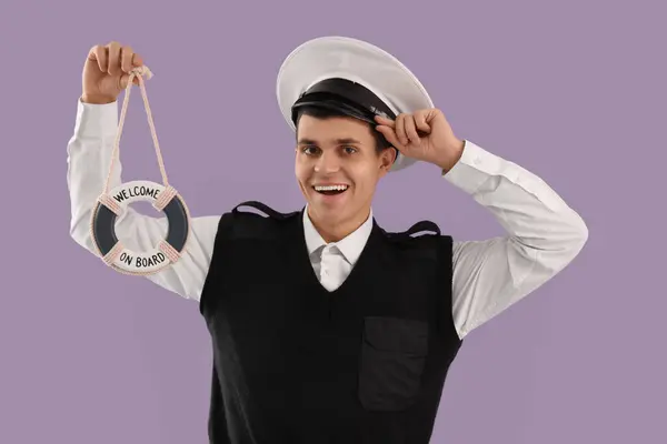 Young Sailor Small Ring Buoy Lilac Background — Stock Photo, Image