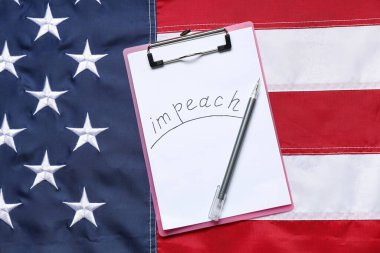 ABD bayrağında IMPEACH sözcüğüyle pano