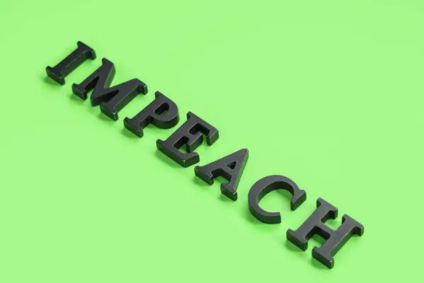 Black Letters Spelling Word Impeachment Green Background — Stock Photo, Image