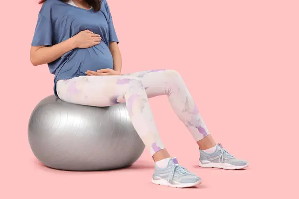 Young Pregnant Woman Sitting Fitball Pink Background — Stock Photo, Image