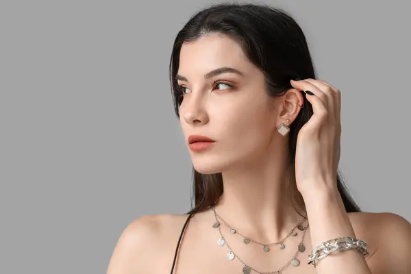 Beautiful Young Woman Stylish Jewelry Grey Background — Stock Photo, Image