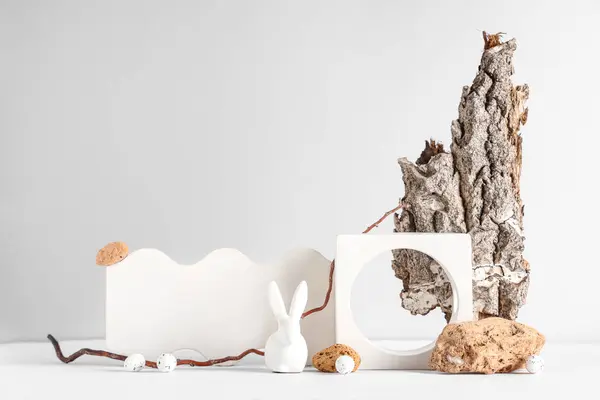 Decorative Podiums Easter Eggs Toy Bunny Tree Bark Grey Background — Stock Photo, Image