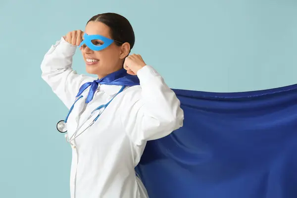 Beautiful Female Doctor Superhero Costume Showing Muscles Blue Background — Stock Photo, Image