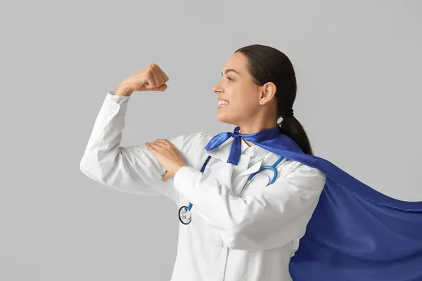 Beautiful Female Doctor Superhero Costume Showing Muscles White Background — Stock Photo, Image