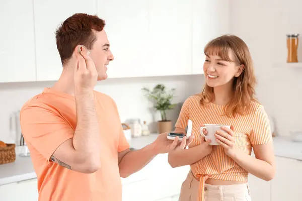 Young Deaf Mute Couple Hearing Aid Kitchen Stock Photo