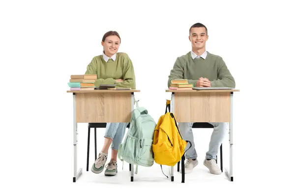 Students Books Sitting School Desks White Background End School Concept — Stock Photo, Image