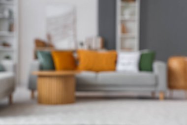 3 boyutlu resim, kanepe ve masa ile oturma odasının bulanık görüntüsü