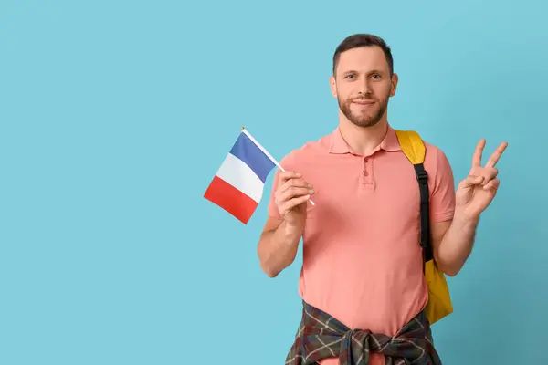 Male Student Flag France Showing Victory Gesture Blue Background — Stock Photo, Image