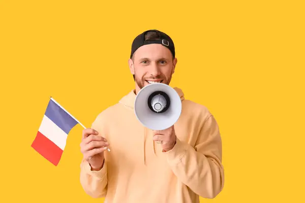 Young Man Flag France Megaphone Yellow Background — Stock Photo, Image