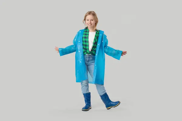 Adorable Girl Raincoat Rubber Boots Grey Background — Stock Photo, Image