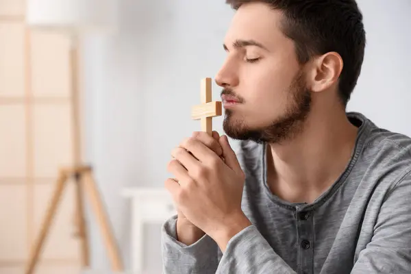 Young Man Wooden Cross Praying Bedroom — Stock Photo, Image