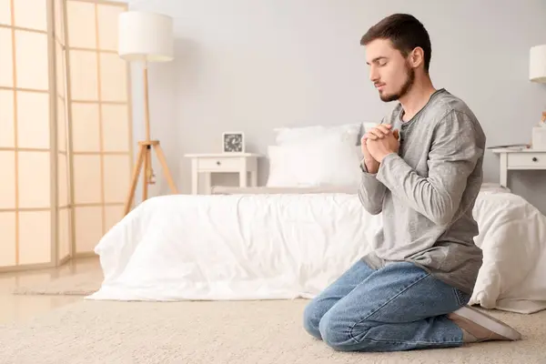 Young Man Praying Floor Bedroom — Stock Photo, Image