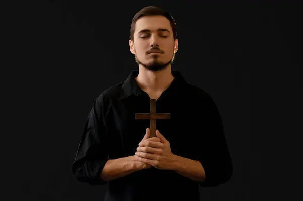 Young Man Wooden Cross Praying Black Background — Stock Photo, Image