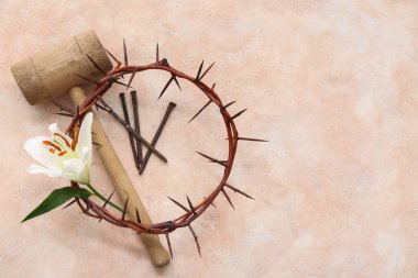 Crown of thorns with lily, hammer and nails on light background clipart