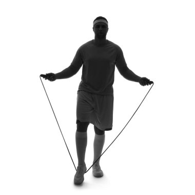 Beyaz arka planda ip ile atlayan genç bir adamın silueti.