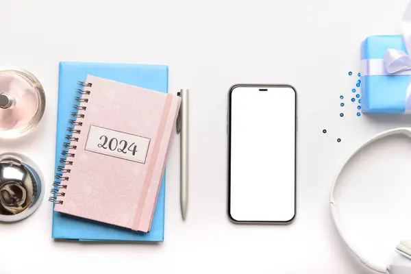 Komposition Mit Modernen Mobiltelefonen Notebooks Und Parfüm Auf Weißem Hintergrund — Stockfoto