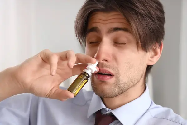 Sick Businessman Using Nasal Drops Office Closeup — Stock Photo, Image