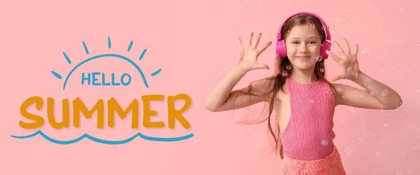 Cute little girl with headphones, soap bubbles and text HELLO, SUMMER on pink background