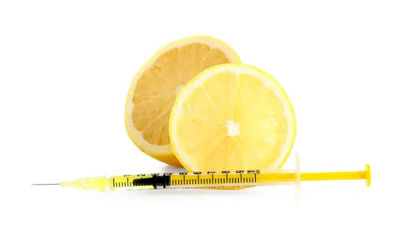 Ruisku Vitamiinia Sitruunan Paloja Valkoisella Pohjalla tekijänoikeusvapaita valokuvia kuvapankista