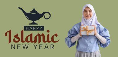 Young Muslim woman with gift on green background. Greeting banner for Islamic New Year