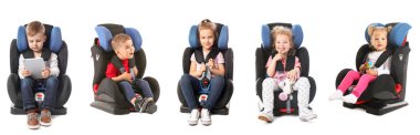 Set of little children in car seats on white background