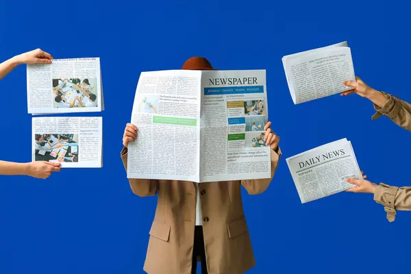 Stock image Woman with hands holding newspapers on blue background