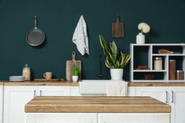 Clean wooden counter in interior of modern kitchen
