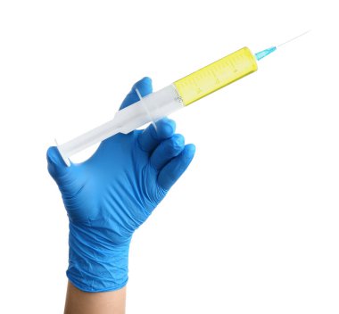 Female doctor with medical syringe on white background