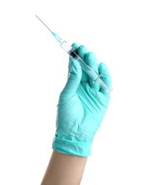 Female doctor with medical syringe on white background