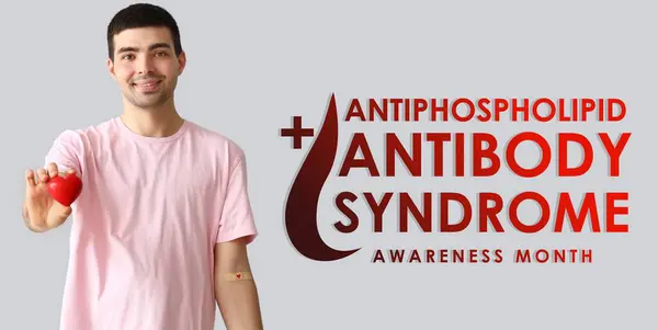 stock image Banner for Antiphospholipid Antibody Syndrome Awareness Month with male donor with heart