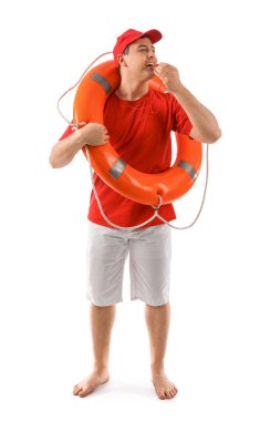 Male lifeguard with ring buoy blowing in whistle isolated on white background clipart