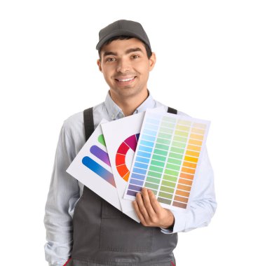 Male painter with color palettes on white background
