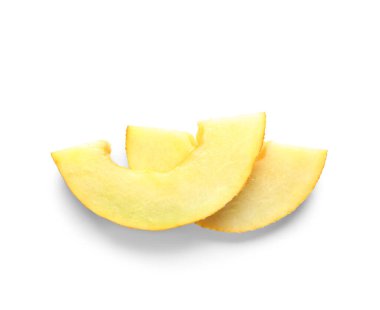 Beyaz arka planda tatlı kavun parçaları