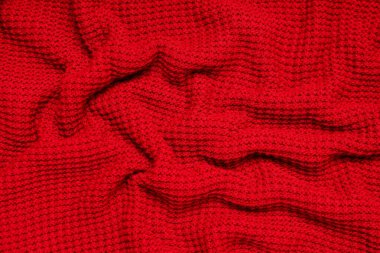 Arka planda kıvrımları olan şık örülmüş kumaş dokusu